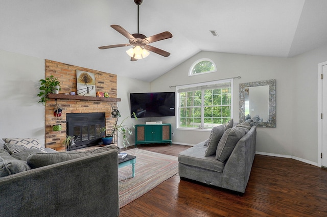 5911 S Farm Rd Unit 157, Springfield, MO 65810 - living area featuring ceiling fan, vaulted ceiling, wood finished floors, and a fireplace