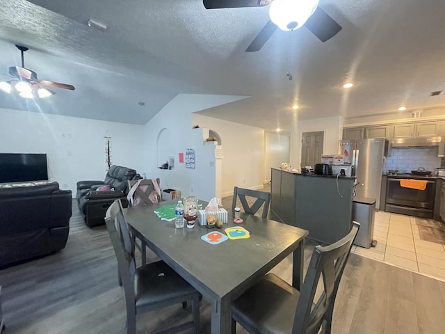 718 S Ridgecrest Ave, Nixa, MO 65714 - dining area featuring ceiling fan, light wood finished floors, a textured ceiling, and recessed lighting