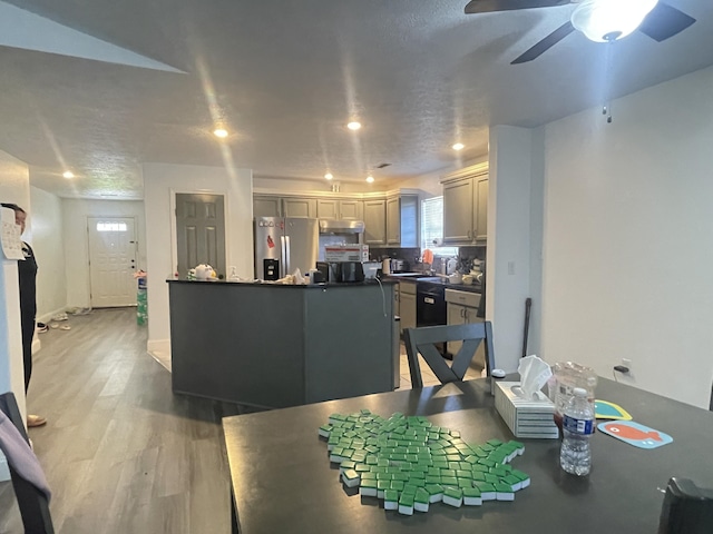 718 S Ridgecrest Ave, Nixa, MO 65714 - dining area featuring light wood-style flooring, a ceiling fan, and recessed lighting