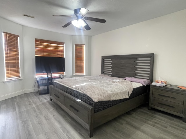 718 S Ridgecrest Ave, Nixa, MO 65714 - bedroom with wood finished floors and a ceiling fan