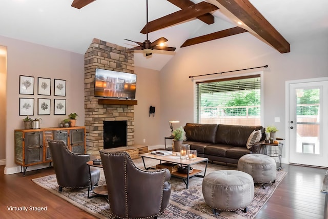 416 W Saddle Club Rd, Fair Grove, MO 65648 - living room featuring ceiling fan, beamed ceiling, wood finished floors, a fireplace, and plenty of natural light