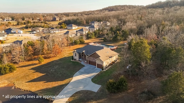 416 W Saddle Club Rd, Fair Grove, MO 65648 - aerial perspective of suburban area featuring a heavily wooded area