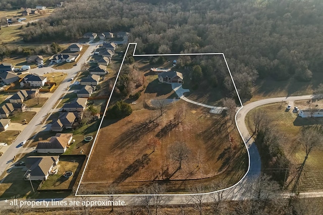 416 W Saddle Club Rd, Fair Grove, MO 65648 - aerial perspective of suburban area featuring a forest and property parcel outlined