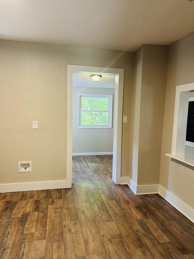 652 W Hovey St, Springfield, MO 65802 - empty room with wood-type flooring and a textured wall