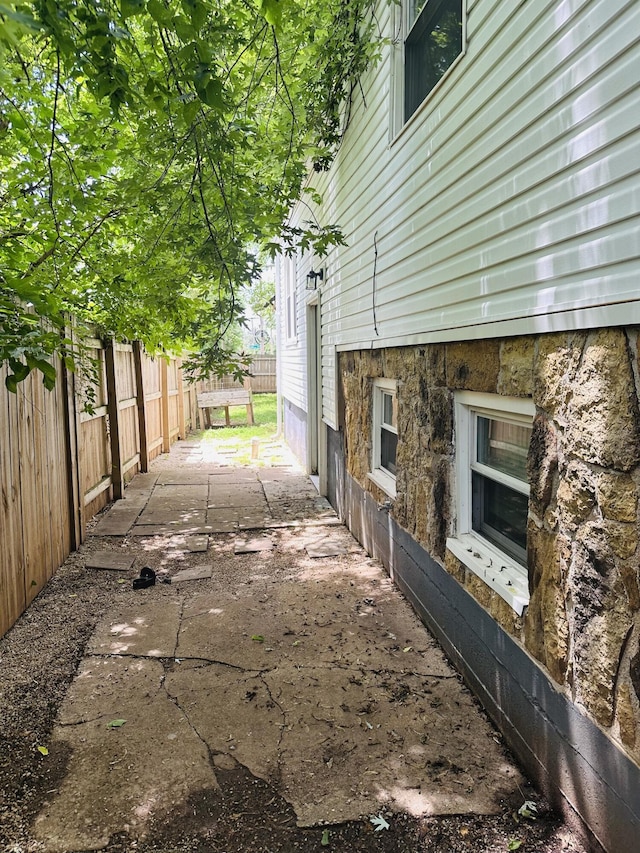652 W Hovey St, Springfield, MO 65802 - fenced backyard with a patio area