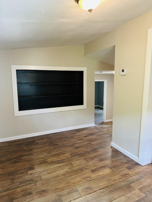652 W Hovey St, Springfield, MO 65802 - spare room with wood finished floors and baseboards