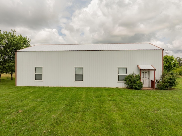 5435 State Highway 14, Sparta, MO 65753 - view of home's exterior featuring a yard, a metal roof, and an outbuilding