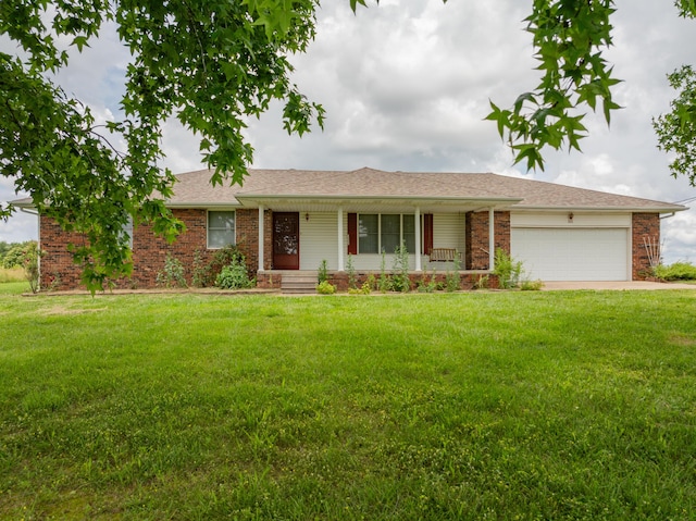5435 State Highway 14, Sparta, MO 65753 - ranch-style home featuring a garage, covered porch, a front yard, and concrete driveway