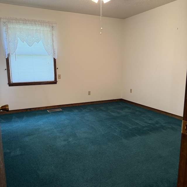5435 State Highway 14, Sparta, MO 65753 - unfurnished room with dark colored carpet and ceiling fan