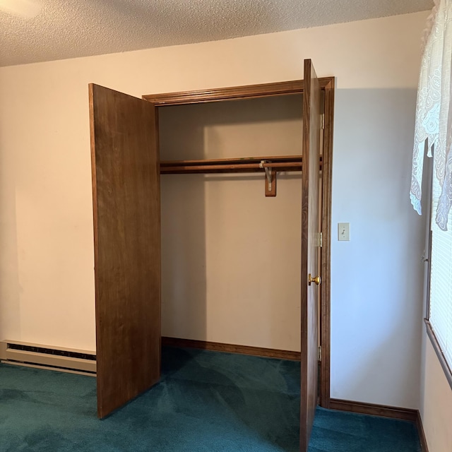 5435 State Highway 14, Sparta, MO 65753 - closet featuring a baseboard radiator