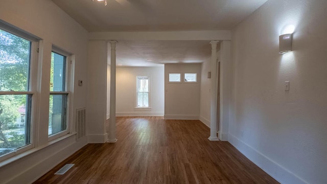220 S 3rd St, Thayer, MO 65791 - corridor featuring ornate columns and dark wood-type flooring