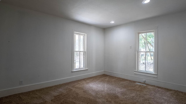 220 S 3rd St, Thayer, MO 65791 - empty room with carpet flooring and recessed lighting