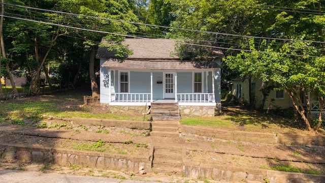 220 S 3rd St, Thayer, MO 65791 - bungalow-style home featuring covered porch and a shingled roof