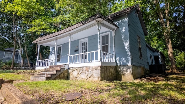 220 S 3rd St, Thayer, MO 65791 - view of front facade featuring a porch