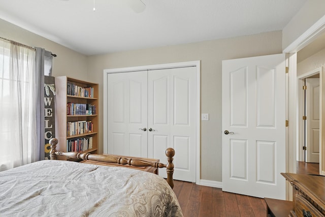 1925 Sylvan Ave, Neosho, MO 64850 - bedroom featuring a closet, dark wood-style floors, and ceiling fan