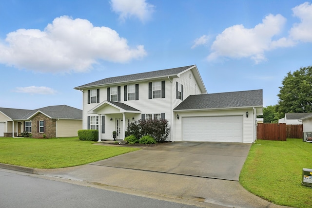 1925 Sylvan Ave, Neosho, MO 64850 - colonial home with an attached garage and concrete driveway