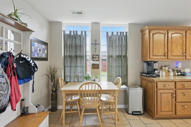 1925 Sylvan Ave, Neosho, MO 64850 - dining area featuring light tile patterned floors