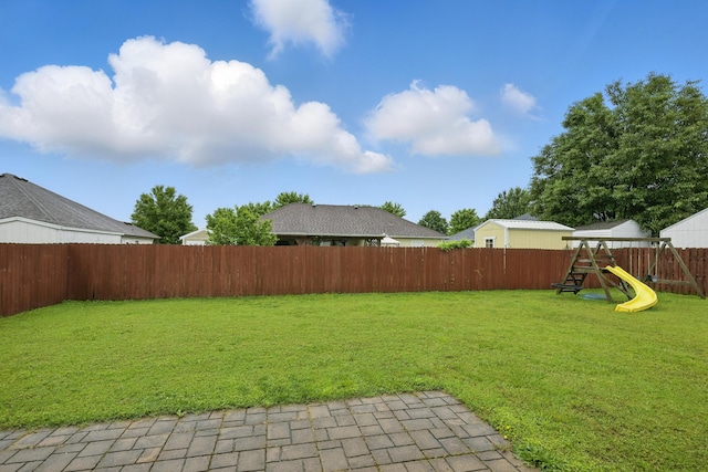 1925 Sylvan Ave, Neosho, MO 64850 - fenced backyard with a playground