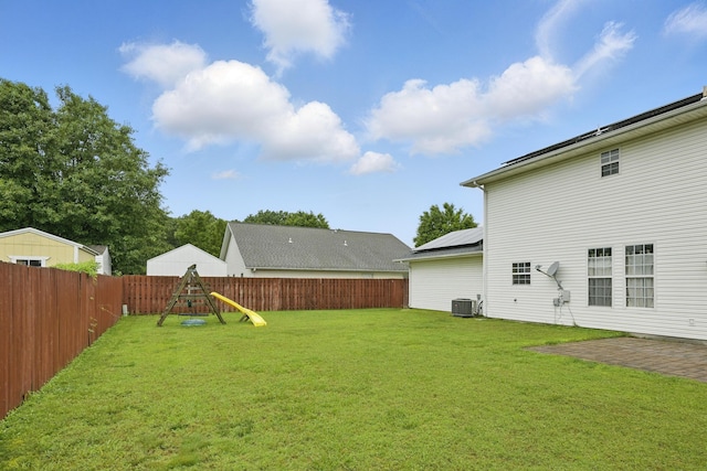 1925 Sylvan Ave, Neosho, MO 64850 - fenced backyard with a playground