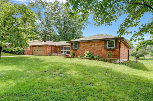 3112 E Lomita St, Springfield, MO 65804 - ranch-style home with an attached garage and brick siding