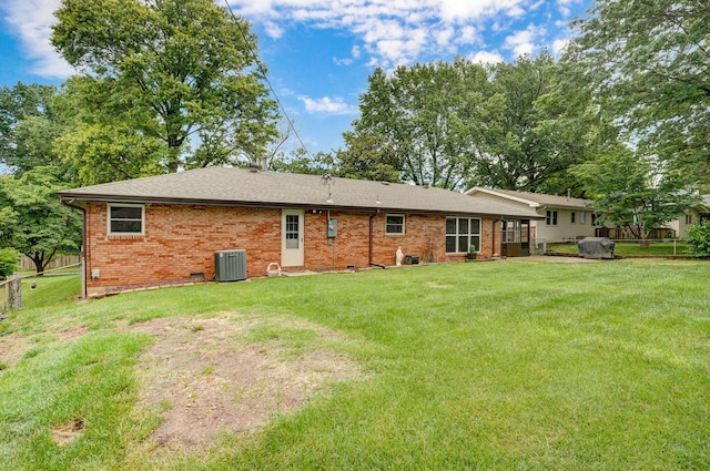 3112 E Lomita St, Springfield, MO 65804 - back of property featuring brick siding, roof with shingles, and crawl space