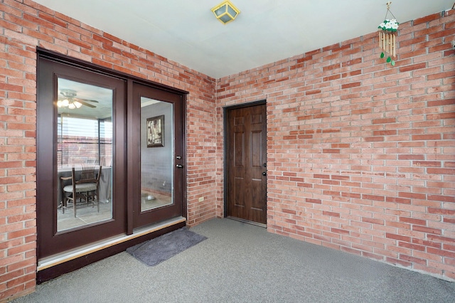 3112 E Lomita St, Springfield, MO 65804 - doorway to property featuring brick siding