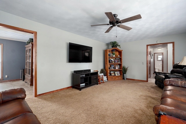 3112 E Lomita St, Springfield, MO 65804 - living area with light carpet, a ceiling fan, and radiator