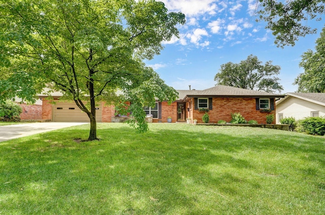 3112 E Lomita St, Springfield, MO 65804 - ranch-style home featuring brick siding, driveway, an attached garage, and a front yard