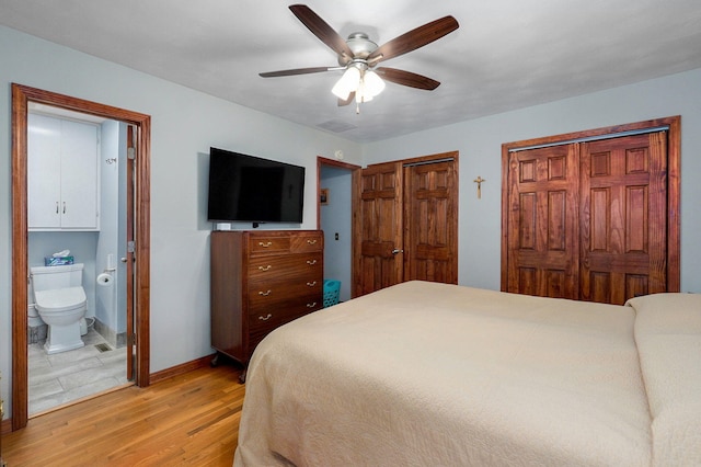 3112 E Lomita St, Springfield, MO 65804 - bedroom with light wood-style flooring, two closets, connected bathroom, and a ceiling fan