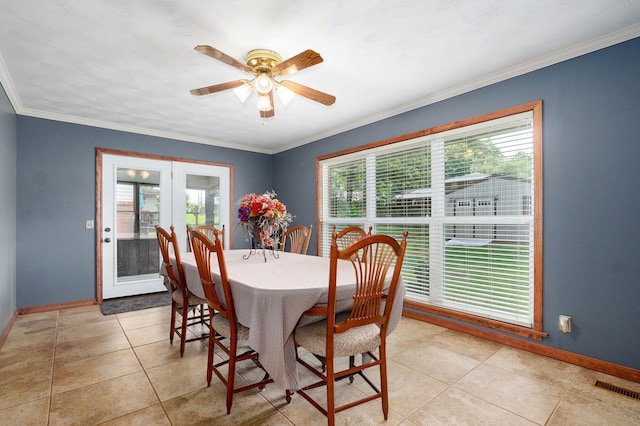 3112 E Lomita St, Springfield, MO 65804 - dining space with ceiling fan, light tile patterned floors, and ornamental molding