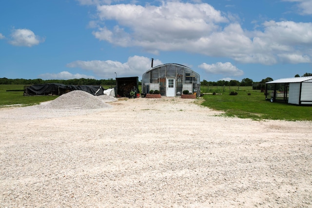3889 E State Highway Kk, Fair Grove, MO 65648 - view of outbuilding with a carport and driveway