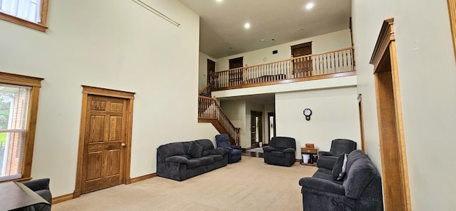 3889 E State Highway Kk, Fair Grove, MO 65648 - living area featuring carpet, stairway, recessed lighting, and a high ceiling