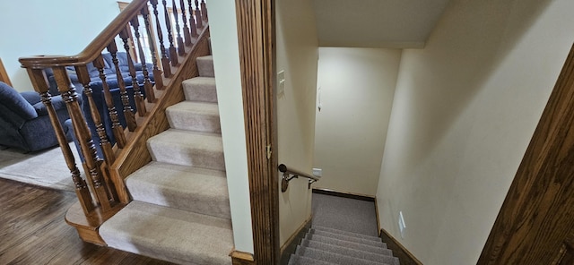 3889 E State Highway Kk, Fair Grove, MO 65648 - staircase with wood finished floors and baseboards