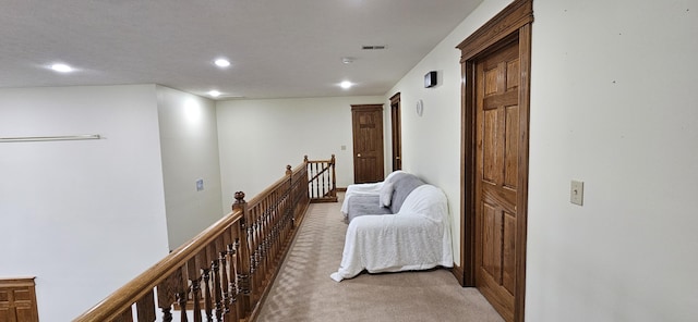 3889 E State Highway Kk, Fair Grove, MO 65648 - corridor featuring an upstairs landing, light carpet, and recessed lighting