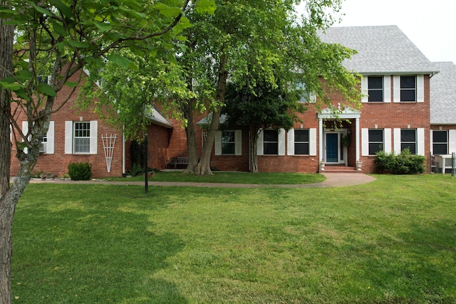 3889 E State Highway Kk, Fair Grove, MO 65648 - view of front of property featuring a front yard, brick siding, and roof with shingles