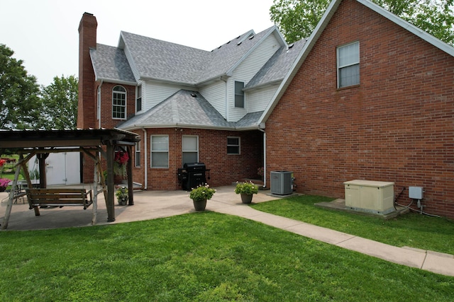 3889 E State Highway Kk, Fair Grove, MO 65648 - back of house with a pergola, a chimney, roof with shingles, and a patio