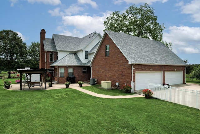 3889 E State Highway Kk, Fair Grove, MO 65648 - rear view of house with a chimney, a shingled roof, a garage, brick siding, and concrete driveway