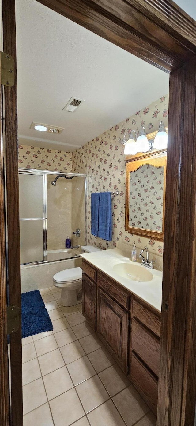 3889 E State Highway Kk, Fair Grove, MO 65648 - bathroom featuring wallpapered walls, enclosed tub / shower combo, vanity, and tile patterned floors
