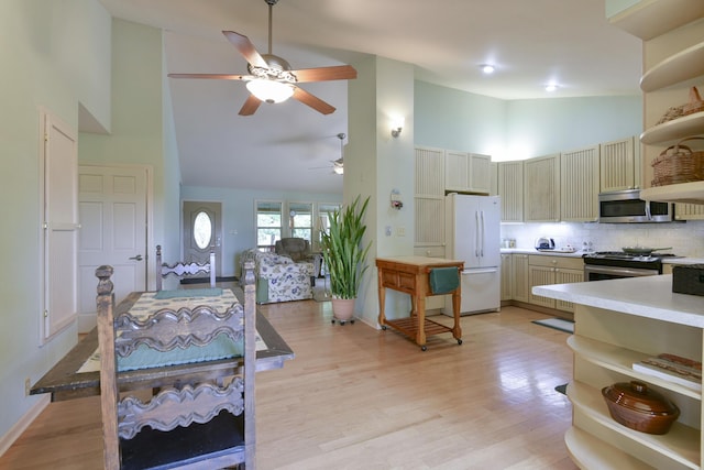 164 Sweet Home Trl, Theodosia, MO 65761 - kitchen featuring appliances with stainless steel finishes, open shelves, high vaulted ceiling, ceiling fan, and light countertops