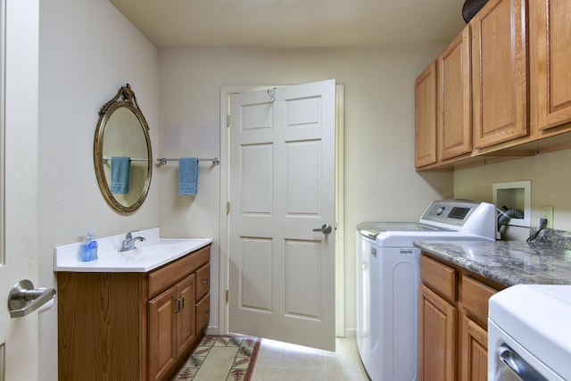 164 Sweet Home Trl, Theodosia, MO 65761 - washroom with washing machine and clothes dryer, cabinet space, and light tile patterned floors