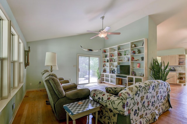 164 Sweet Home Trl, Theodosia, MO 65761 - living area featuring a ceiling fan, wood finished floors, and high vaulted ceiling
