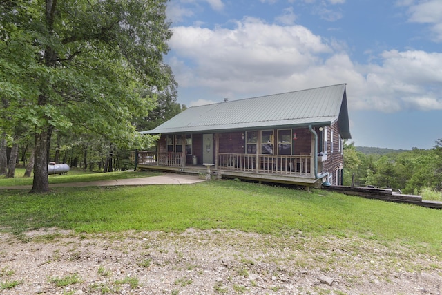 164 Sweet Home Trl, Theodosia, MO 65761 - view of front of property with a front yard, a metal roof, and a porch