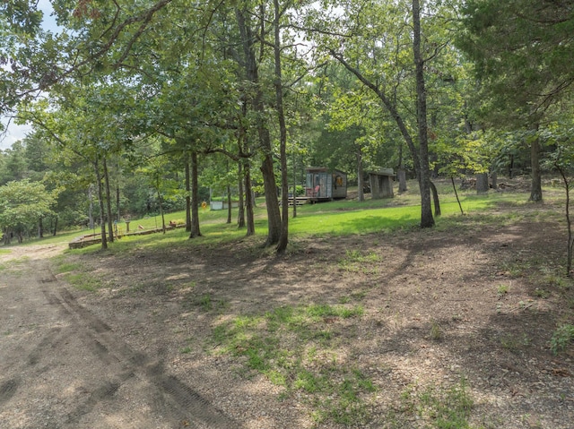 164 Sweet Home Trl, Theodosia, MO 65761 - view of green lawn with an outbuilding