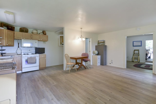 164 Sweet Home Trl, Theodosia, MO 65761 - kitchen featuring white appliances, light wood finished floors, light countertops, a chandelier, and pendant lighting