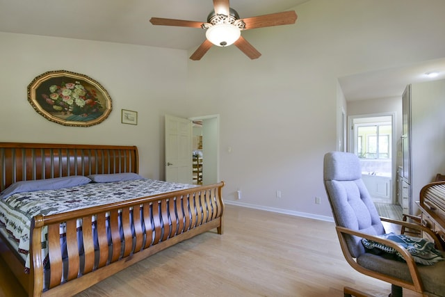 164 Sweet Home Trl, Theodosia, MO 65761 - bedroom featuring light wood-style floors, a ceiling fan, and a high ceiling