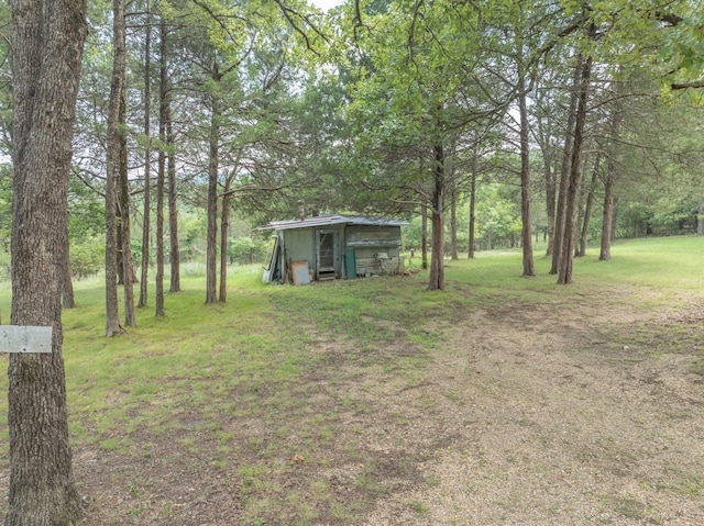 164 Sweet Home Trl, Theodosia, MO 65761 - view of green lawn with a storage shed