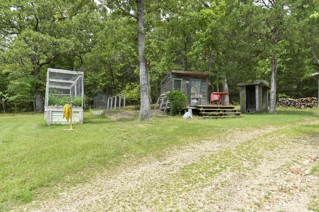 164 Sweet Home Trl, Theodosia, MO 65761 - view of grassy yard featuring exterior structure and an outbuilding