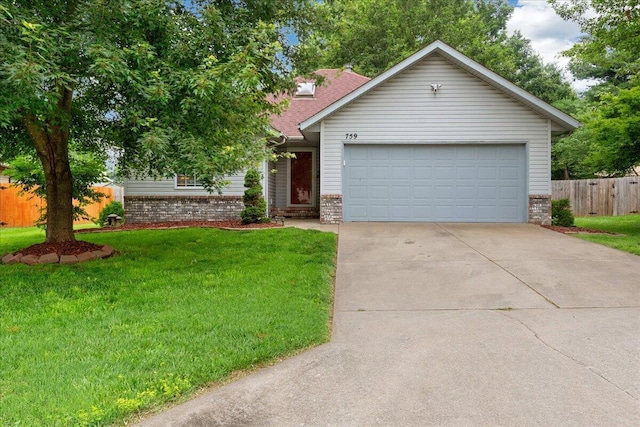 759 S Troy Ave, Springfield, MO 65802 - view of front of home with brick siding, driveway, a garage, and a shingled roof