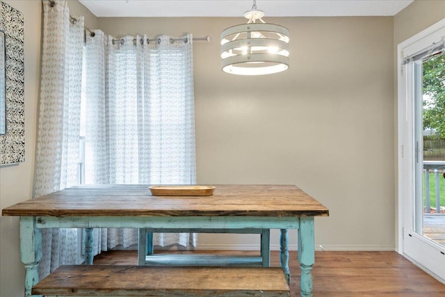 759 S Troy Ave, Springfield, MO 65802 - dining room featuring wood finished floors and a chandelier