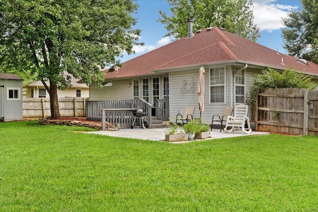 759 S Troy Ave, Springfield, MO 65802 - rear view of property featuring a patio area and a shingled roof